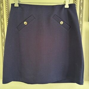 Jones New York skirt skort in navy with faux button detail. EUC.